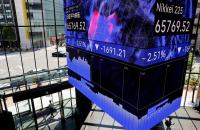 Asia shares fall on tech nerves; oil prices slip