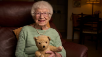 She fled Vienna at 12. Now, at 99, she returns