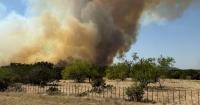 Texas wildfire balloons within hours, ripping through ranchlands