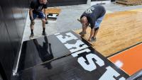 Reno Tropics floor installation begins after Idaho arrest in $40K case