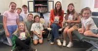 Children's author reads at GWR station and donates her books