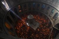 A night locked inside Jerusalem’s holiest church with clergy and pilgrims