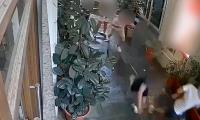 Moment Brit tourist is robbed of his £20,000 watch by thieves who used pepper spray on family 'to create confusion' before fleeing in Florence