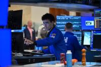 Stocks end lower after hot U.S. inflation data