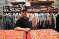 At Billy’s Hmong Shop, handsewn garments help keep Hmong funeral tradition alive