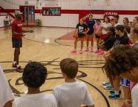 WATCH | Former Razorback Devo Davis brings trademark energy to youth camp