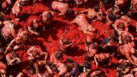 Epic La Tomatina food fight paints a small Spanish town red