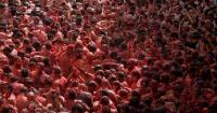 La Tomatina food fight paints small Spanish town red