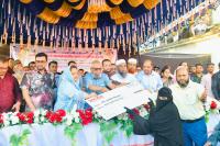 Ariful hands over financial aid to families of five Bangladeshis died in Qatar accident 