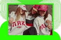 Parke’s Viral Collegiate Sweatshirts Are Still in Stock, From Schools Tied to Music Legends & More