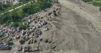 Flash flood tears through Nepal, killing scores and leaving over 400 tourists missing, including Americans