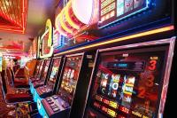 Investment banks cut August gaming revenue forecasts