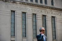 Mining, energy stocks lift TSX past trade-war fears