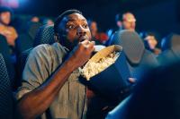 Here’s How Popcorn Became the Ultimate Movie Snack—And Why It Wasn’t Allowed in Theaters Originally