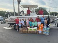 Boston Whaler Gives Backpacks to School Kids
