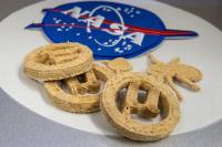 Scientists turn plastic bottles into vanilla cookies for emergency space rations