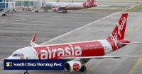 Malaysian airport staff find body in wheel well of plane from Japan