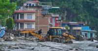 Fears for 'lovely' Australians missing in Nepal flood