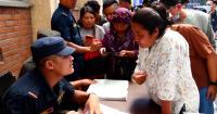 Families await news of missing loves ones after catastrophic floods