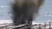 Moment explosive-laden drone is detonated at resort in Romania after being pulled out of sea by two tourists