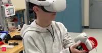 A New Hampshire eighth grader with underdeveloped fingers couldn't use a VR controller normally, so he invented his own adaptive device that lets him play