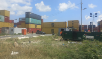 Cuban national found crushed to death under container at shipping terminal