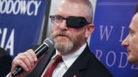 Polish Far-Right Lawmaker Charged With Denying Nazi Crimes Over Auschwitz Gas Chamber Claims