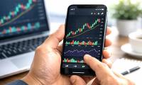 Asian stocks mixed after Wall St slides following economic updates