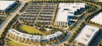 Defense contractor exchanges one East County city for another