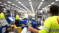 Parcels, real estate sales send AusPost profit higher