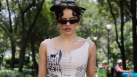 Rosalía's Newspaper-Print Dress Follows in Carrie Bradshaw's Footsteps—For Under $160