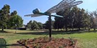 Restored dragonfly sculpture returns to Forsythe Park