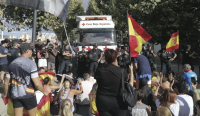 Tensions erupt in Ceuta as protesters block food aid to migrants and government appeals for calm