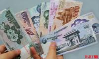 As won crashes, rural North Koreans rush to buy dollars