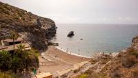 Tourists’ terror in new migrant landing zone at Spanish resort where arrivals sprint past sunbeds… & plan to reach UK