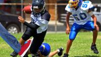 Wisconsin Parent Charged After Tripping Nine-Year-Old To Stop Him From Scoring A Touchdown During Youth Football Game