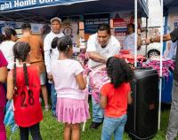 More than 500 Queens children join back-to-school giveback and family day
