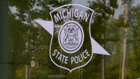 Mother sought after baby found dead in porta-potty at Michigan music festival