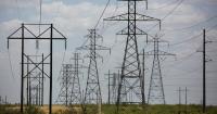 Despite protest, regulators clear path for bigger transmission lines across Texas