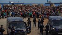 Spanish protesters and migrants clash with police in Ceuta one month after surge
