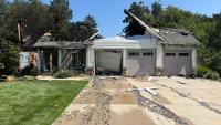 1 taken to hospital, house heavily damaged in Holland fire