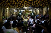 In war-split Myanmar 'spirit consorts' commune across divide