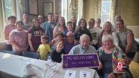 Massachusetts volunteers honor veterans through Purple Heart signs and charity events
