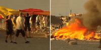 Furious Spanish locals torch Ceuta migrant camp as tensions boil over following 'invasion'