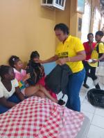 Over 250 students receive backpacks at Free Town Foundation Health Fair