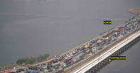 Aug 29: Heavy departure traffic at Woodlands Checkpoint, tailback seen from Malaysia