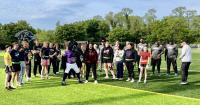 Players take field at Washington College under watchful eye of Baltimore Ravens coach