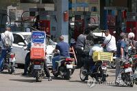 Iranians Rush to Fill Tanks as U.S. Isolation Fuels Shortage Fears