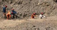 Rescuers battle waist-deep mud to search for missing after fatal mudslide in China's Xizang