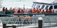 French police investigate death of small boat migrant 'who was attacked by other passengers' while trying to cross Channel